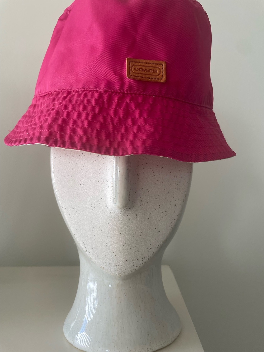 Coach women’s Hot Pink Bucket Hat with Leather Logo Patch